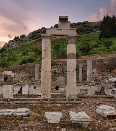Ancient ruins of The RHODIAN PRISTYLE and THE PRYTANEUM in Ephesus, Turkey, at sunset. Majestic...