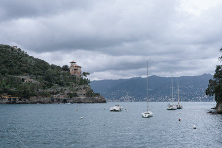 View of the Gulf of Tigulia and the Faro di Portofino lighthouse in winterの写真素材