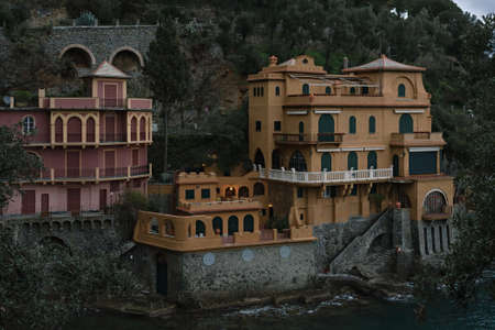 Mediterranean colorful luxury villa with an amazing view over the beautiful bay in the evening in winter. Portofino. Liguria. Italy. Europeの写真素材