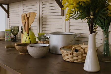 Kitchen with yellow decor elements. Color trend in the interior of the kitchen. Close-up. Background imageの写真素材