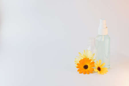 Containers for storing natural cosmetics with calendula flowers. Making cosmetics at home....
