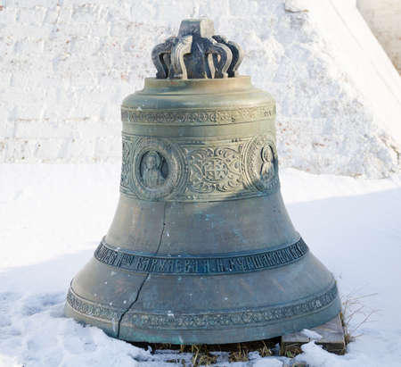 Ancient bronze bell. Old bell in the territory of a nikolsky cathedral. Russia, Republic of Tatarstan, city of Kazan.の写真素材