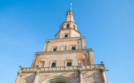 Suyumbike tower against the blue sky. Russia, Republic of Tatarstan, city of Kazan. Historic and Architectural Complex of the Kazan Kremlin.  Suyumbike Tower is built in the sの写真素材