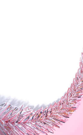 Silver and pink Christmas tinsel background. Template backdrop for design.の写真素材