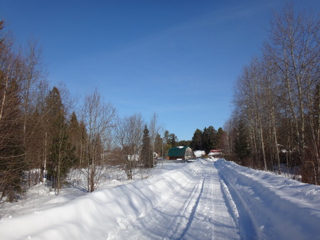 Winter road in suuny dayの写真素材