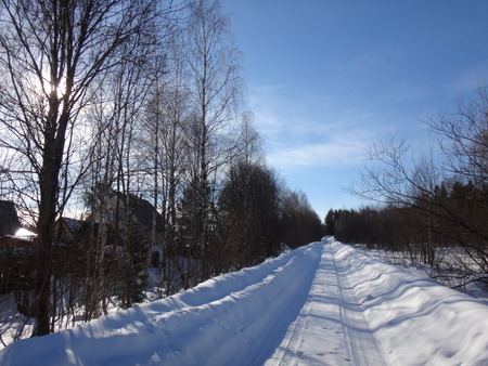 Winter road in suuny dayの写真素材