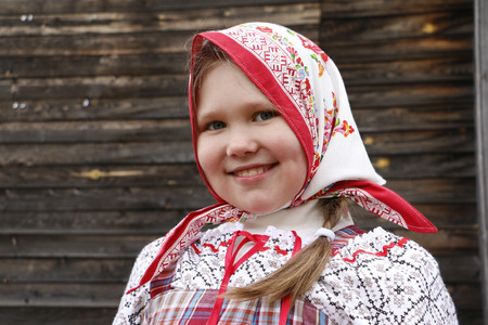 Beautiful young Russian girl in national dressの写真素材