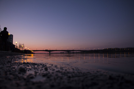 A beautiful sunset in the evening over the waterの写真素材