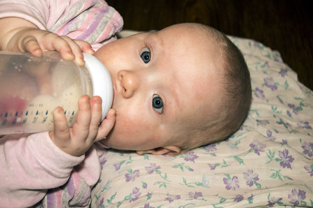Cute funny young childl in the room
