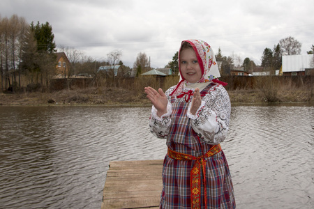Beautiful young Russian girl in national dressの写真素材