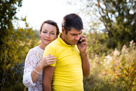 Beautiful couple outdoors in a summer dayの写真素材