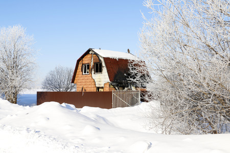 House in a village in a winter dayの写真素材