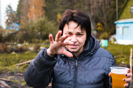 Funny woman outdoors and picnic in autumn dayの写真素材