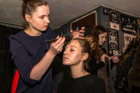 Russia, Kirov - November, 26, 2016: Backstage and make-up before fashion performance Art Chaos in night club Black Rose in Kirov city in 2016のeditorial素材