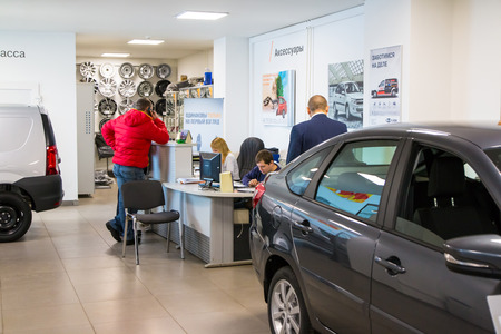 Russia, Kirov - December 05, 2016: Showroom and car Lada of dealership Gusar of factory Avtovaz in...