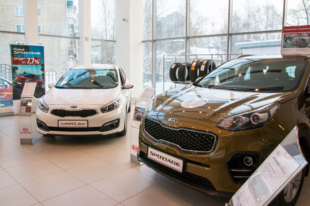 Russia, Kirov - December 05, 2016: Showroom and car KIA of dealership KIA-Zentr Kirov in Kirov city in 2016のeditorial素材