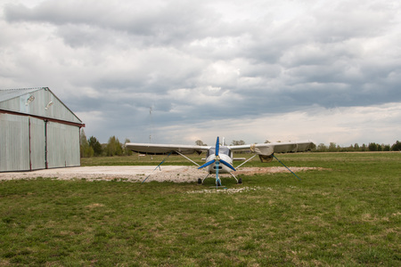 Kirov, Russia - May 07, 2016: The plane on a field near the village Kuchani near Kirov city in 2016