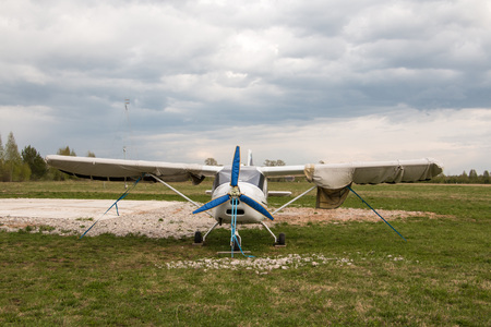 Kirov, Russia - May 07, 2016: The plane on a field near the village Kuchani near Kirov city in 2016
