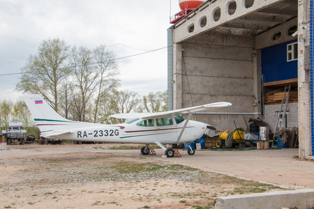 Kirov, Russia - May 07, 2016: The plane on a field near the village Kuchani near Kirov city in 2016