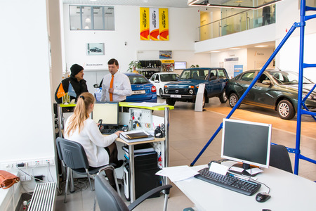 Russia, Kirov - December 05, 2016: Showroom and car Lada of dealership Gusar of factory Avtovaz in Kirov city in 2016のeditorial素材