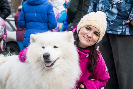 Kirov, Russia - March 13, 2016: People and dogs during the celebration of the end of winter named Maslenitsa in village Shichovo near Kirov city in 2016のeditorial素材