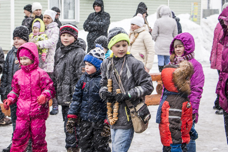 Kirov, Russia - March 13, 2016: People during the celebration of the end of winter named Maslenitsa in village Shichovo near Kirov city in 2016のeditorial素材