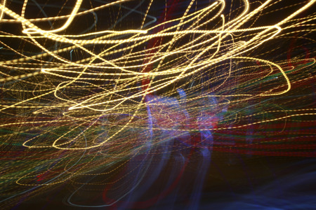 Abstract colored lines in the black darkness