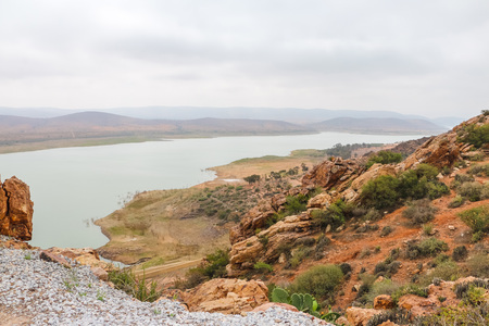 Yellow mountains, laike and beautiful panoramic view in Moriccoの写真素材