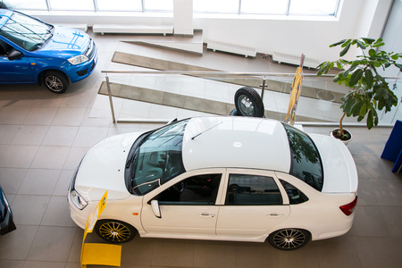 Showroom and car Lada of dealership Gusar of factory Avtovaz inのeditorial素材