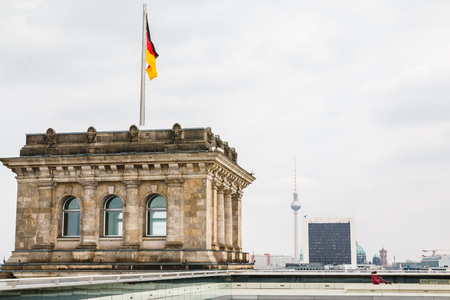 Germany, Berlin - April, 21, 2017: Roof of the Reichstag and the flag of Germany in Berlin in 2017のeditorial素材