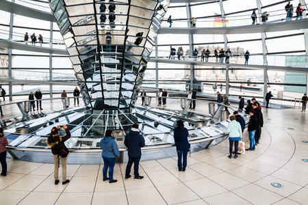 Germany, Berlin - April, 21, 2017: The glass dome of the Reichstag and the people in it in Berlin in 2017のeditorial素材