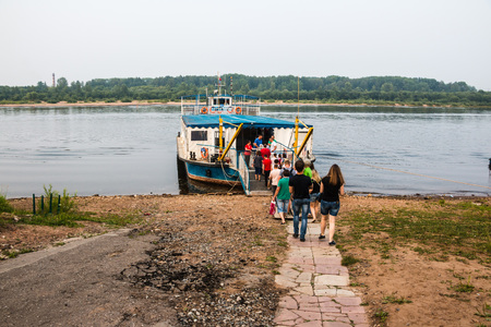 Russia, Kirov - June, 22, 2016: Boat on the river and the people in a summer evening in Kirov city in 2016のeditorial素材
