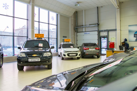 Russia, Kirov - December 06, 2016: Showroom of dealership Chevroled named Souz and car in it in...