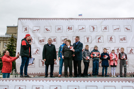 Russia, Kirov - May, 21, 2017: Team athletes on stage during outdoor sport training on the main square of Kirov city in 2017のeditorial素材