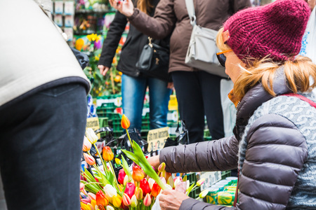Amsterdam, Netherlands - April, 23, 2017: Selling flowers at the flower market in Amsterdam in 2017のeditorial素材