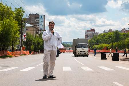 Russia, Kirov - June, 12, 2017: Presenter representing open for citizens of city automobile competition in the birthday of the city Kirov in 2017のeditorial素材
