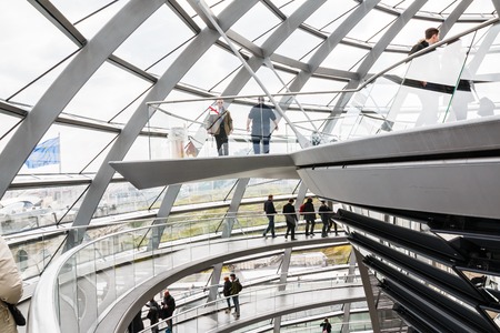 Germany, Berlin - April, 21, 2017: The glass dome of the Reichstag and the people in it in Berlin in 2017のeditorial素材