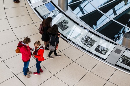 Germany, Berlin - April, 21, 2017: The glass dome of the Reichstag and the people in it in Berlin in 2017のeditorial素材
