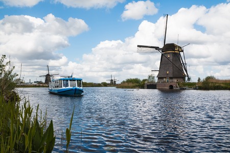 Netherlands, Kinderdijk - April, 26, 2017: Mills and water channel in Kinderdijk in 2017のeditorial素材