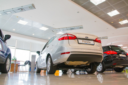 Russia, Kirov - March 01, 2017: Showroom and car of dealership Ford in Kirov city in 2017