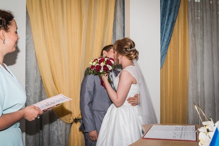 The bride and groom in the registry office at the time of the marriageのeditorial素材