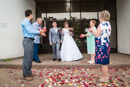 The bride, groom and guests outdoors after the marriage in Kirov city in 2017のeditorial素材