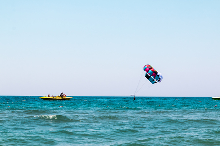 Fly with colorful parachute at the beachのeditorial素材