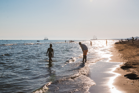 Side, Turkey - June, 24, 2017: People on the beach in a summer day in Side city in Turkeyのeditorial素材