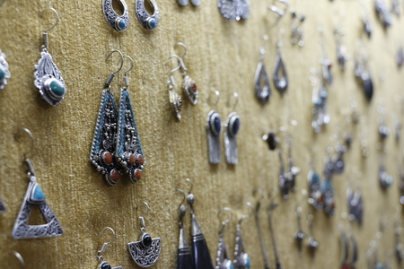 Silver jewelry in a jewelry store indoorsの写真素材