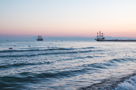 Side, Turkey - June 24, 2017: Pirate ship on the sea in a summer evening during sunsetのeditorial素材