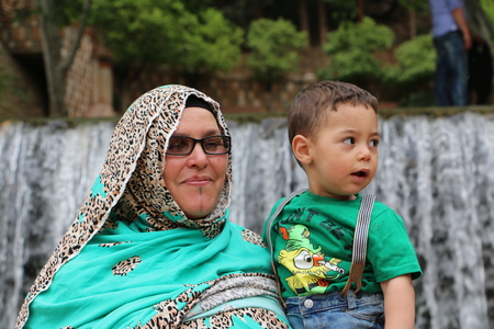 Marrakech, Morocco - May 16, 2016: Park and muslim people walking in it in Marrakech cityのeditorial素材