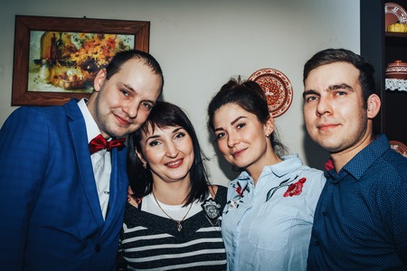Kirov, Russia - November, 24, 2017: Groom and relative together in the decorated roomのeditorial素材