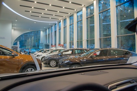 Russia, Kirov - October 18, 2017: Showroom and car of dealership Kia in Kirov city in 2016のeditorial素材
