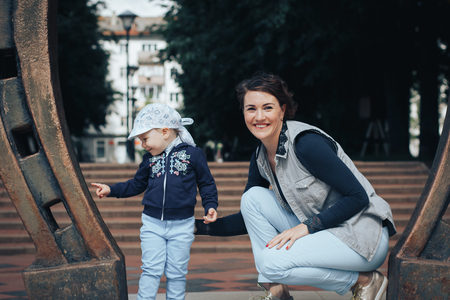 Daughter and mother in the park in a nice dayの写真素材